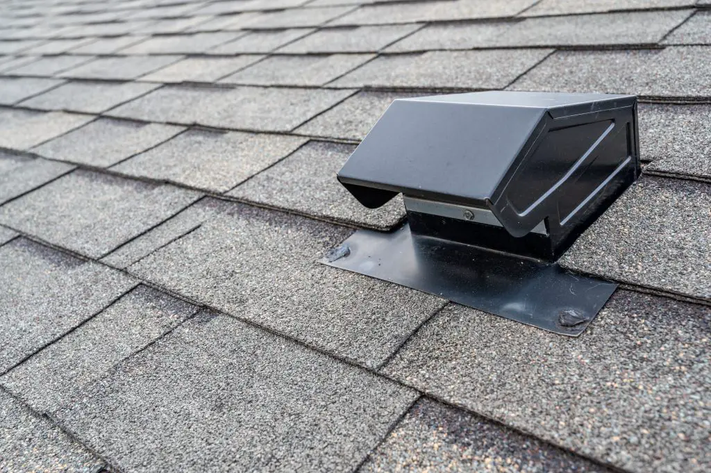 Image of an external vent on the roof of a home. Source: Adobe Stock.