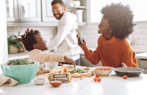 Image Of A Family In Kitchen Making A Pizza Jimmy Dean Unsplash