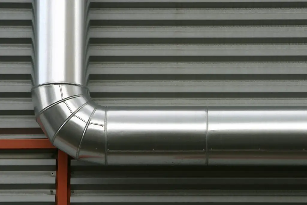 Image of aluminum rigid duct with 90 degree elbow. Source: Free Images