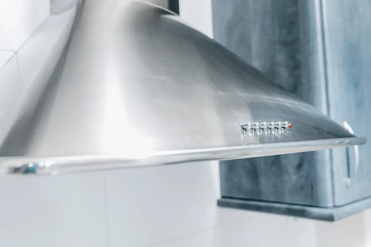 Image of scratched stainless steel range hood with scratches. Source: adobe stock